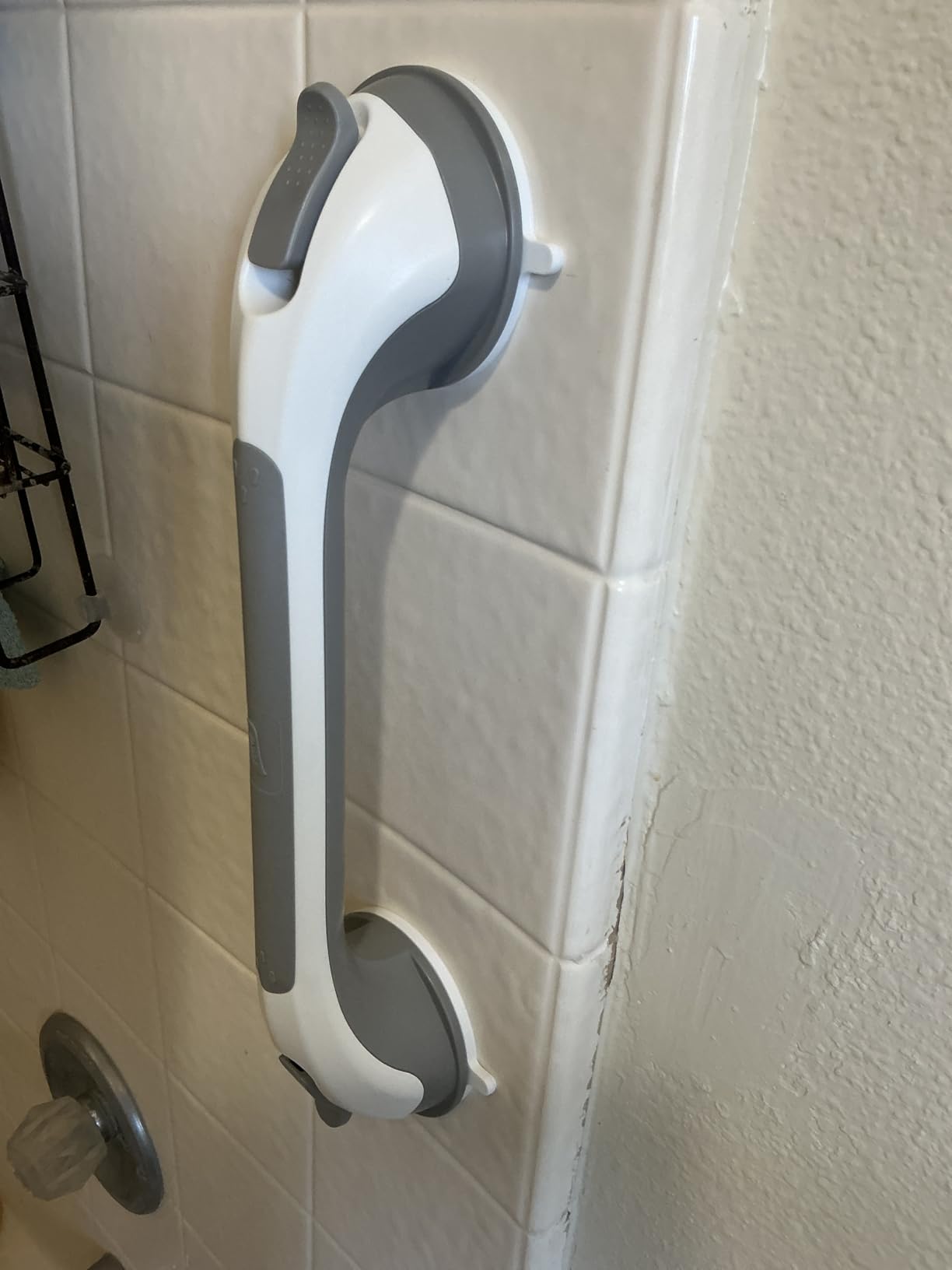 Close-up of shower grab bar
